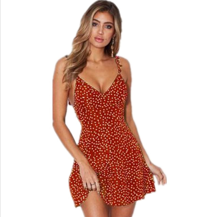Polka dot strappy dress designed for summer days