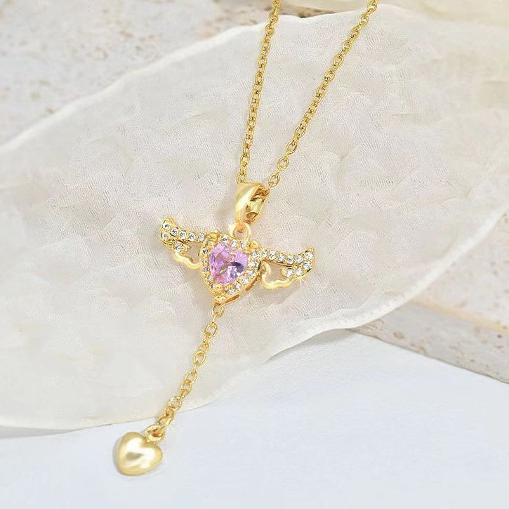 Moving cupid heart necklace with angel wings
